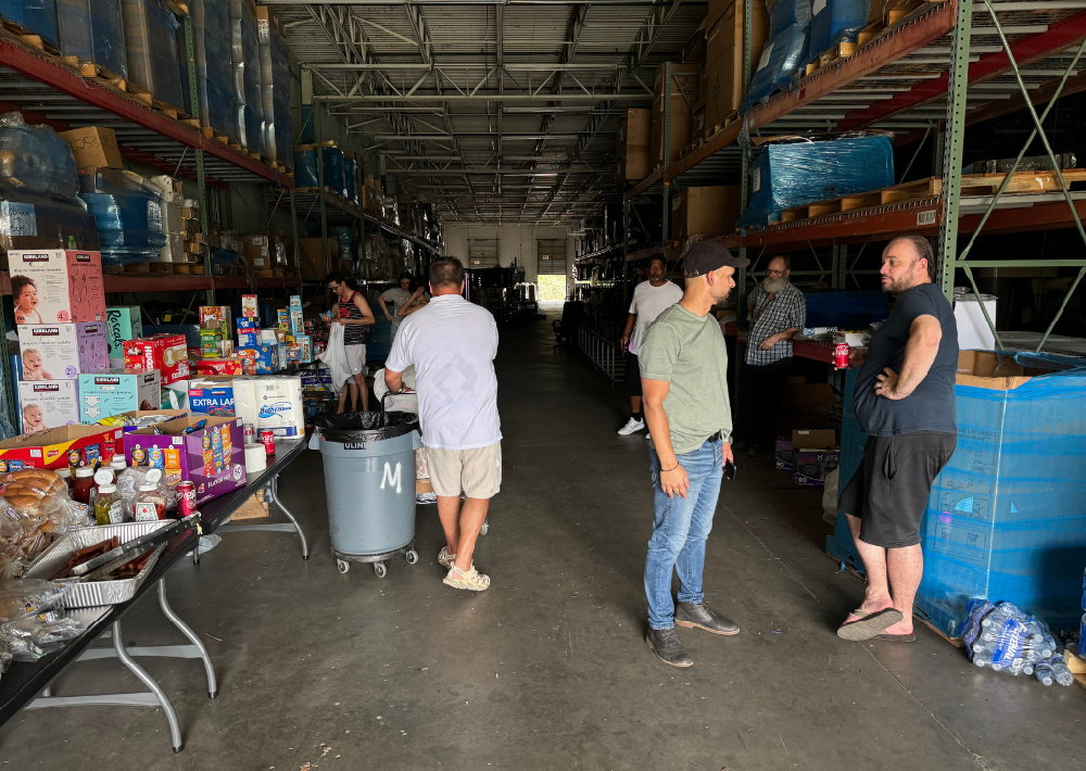 TACO Seating team members organizing supplies.